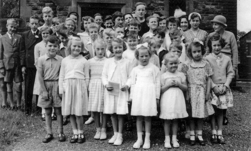 Sunday  School Outing c1950.JPG - Sunday School Outing to St Annes c 1950's Listed left to right: William walker - Derek walker - Alec Lund - Mary Mellin, Howard Cryer - (unknown) - (unknown) - (unknown at back) - Jean Walker (with glasses)  - ? Mellin - Anne Ellershaw - Andrew Frazer (Towser) - Mary Towler - Brian Morris - David Morris - Michael Chafer - (unknown front) - (unknown)  - (unknown) - (unknown back) - (unknown) - (unknown) - (unknown) - Minister - ? Nurse - Marian Parker - (unknown) - (unknown)  - ? Lund (at back) - (unknown) -  Linda Robertshaw - (unknown) - (unknown) - (unknown) - Sheila Lund - Margaret Parker - ? Frazer  - Miss Metcalfe - (unknown not Susan Sheperd)